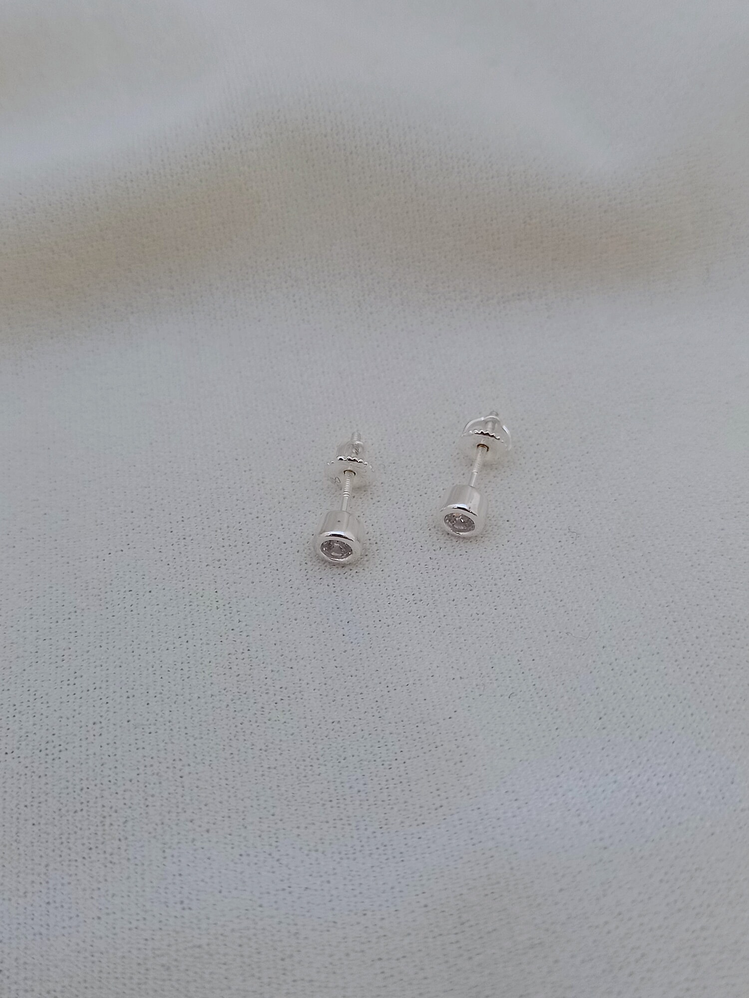 Caravanas Punto de luz plata