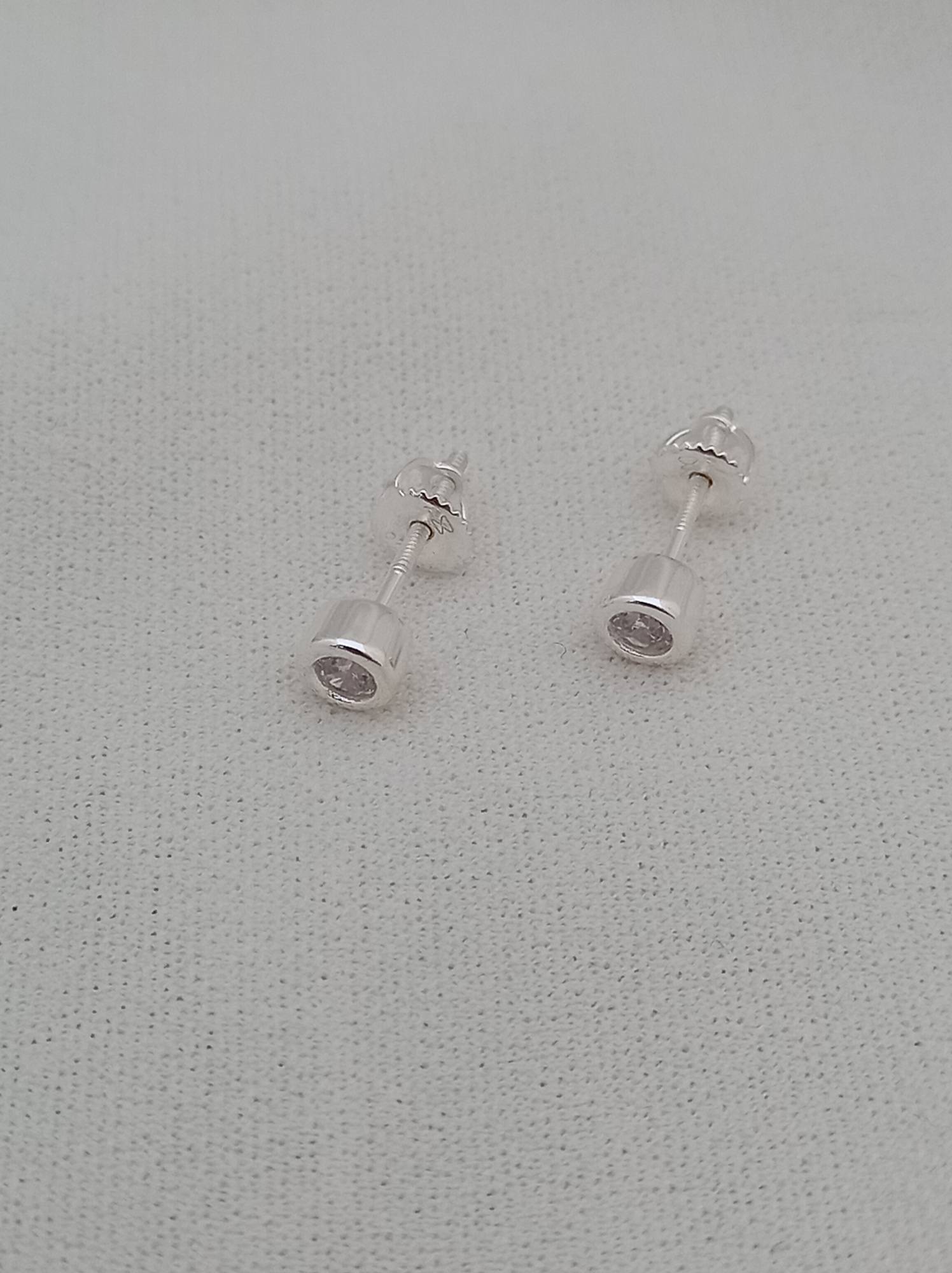 Caravanas Punto de luz plata