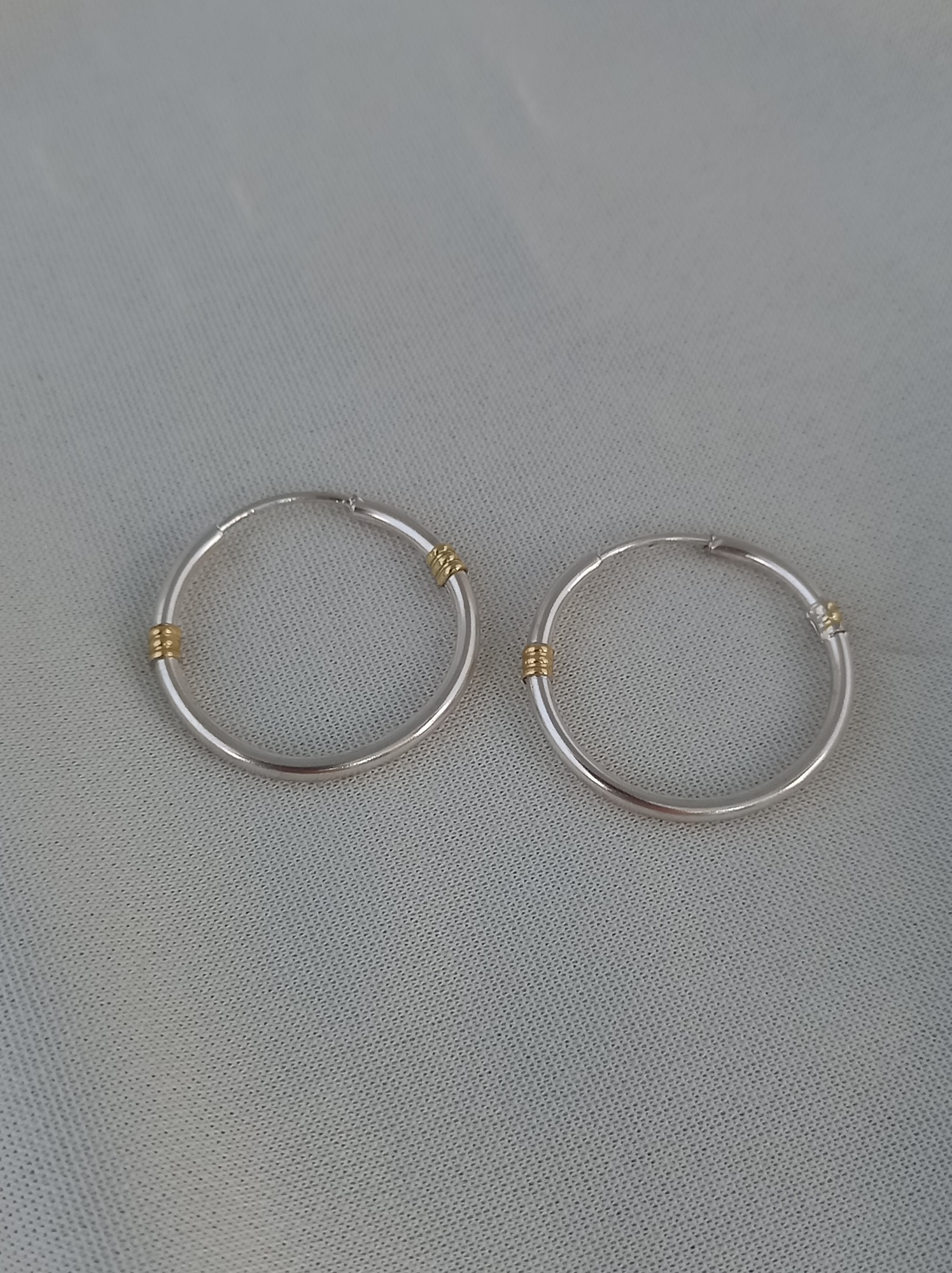 Caravanas Corola sutil