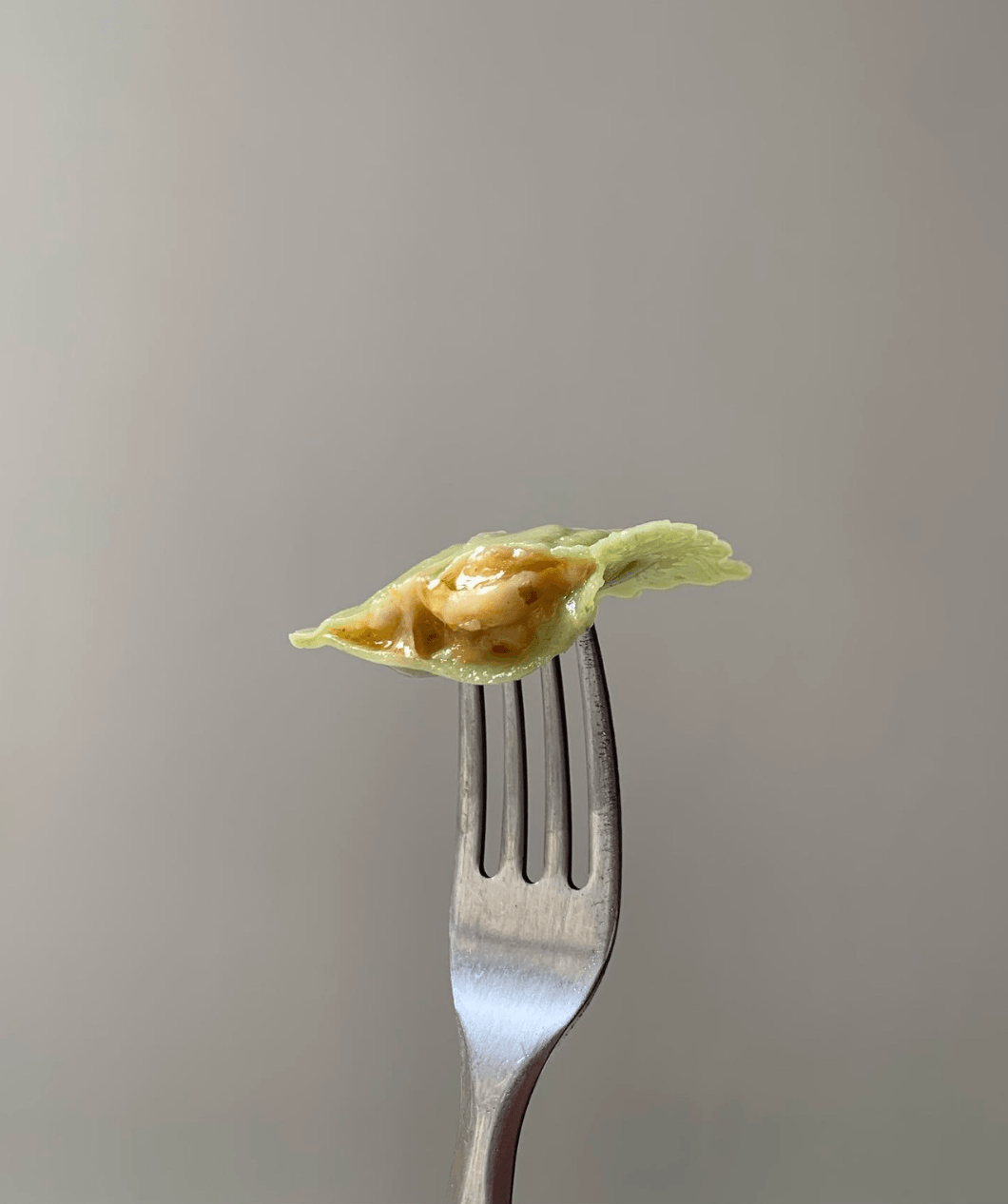 Raviolones de calabaza, muzza y nuez